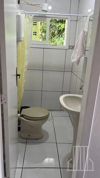 EXCELENTE CASA À VENDA NO BAIRRO ARROIO TEIXEIRA EM CAPÃO DA CANOA!: 5ª foto da galeria de imagens do imóvel