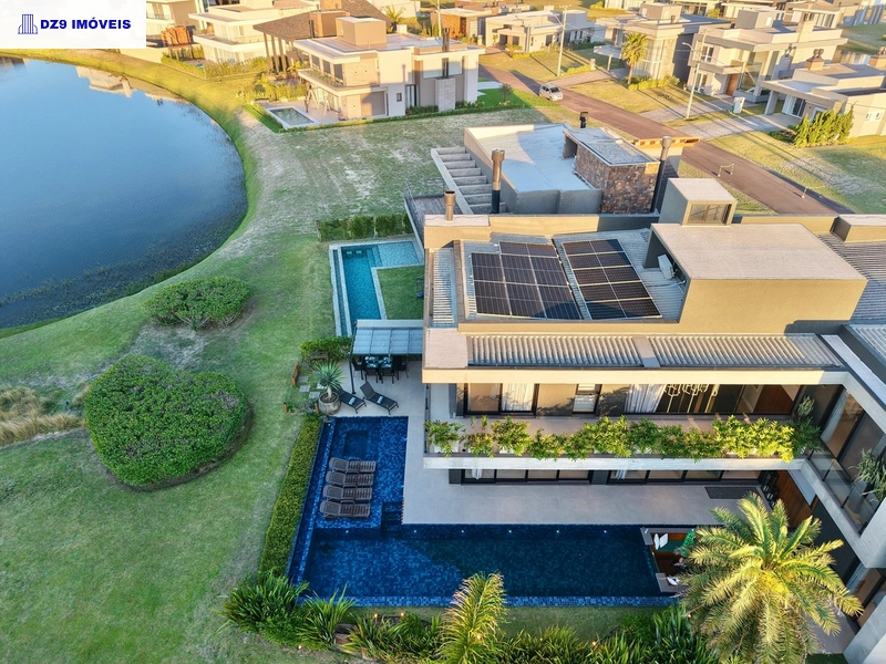 Casa alto padrão, 5 suítes, vista lago, piscina e automação total: 8ª foto da galeria de imagens do imóvel