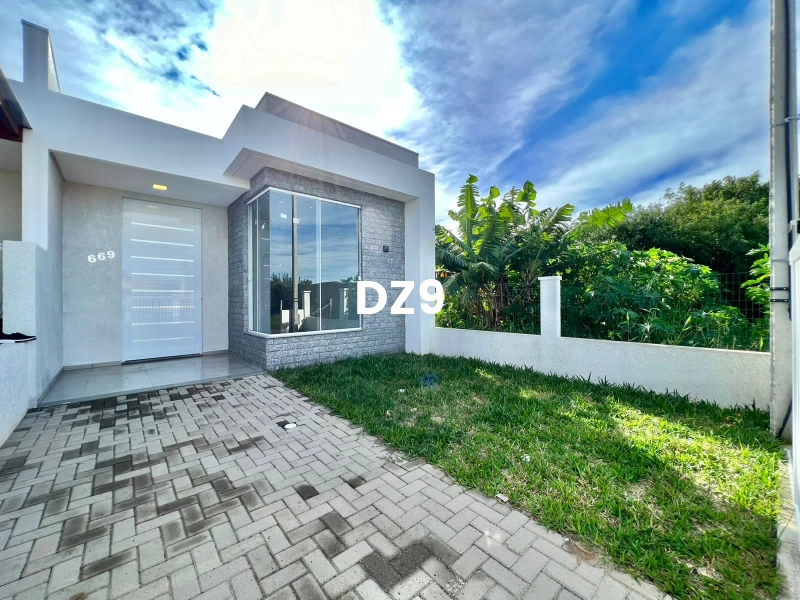 CASA COM 2 DORMITORIOS, SENDO 1 SUITE BEM LOCALIZADO!: 2ª foto da galeria de imagens do imóvel