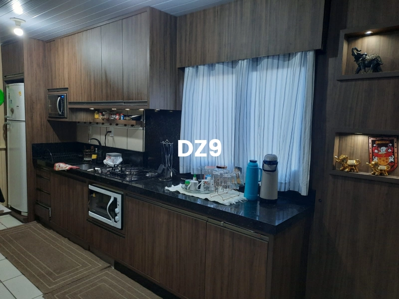 CASA COM 2 DORMITORIOS, SENDO 1 SUITE BEM LOCALIZADA!: 9ª foto da galeria de imagens do imóvel
