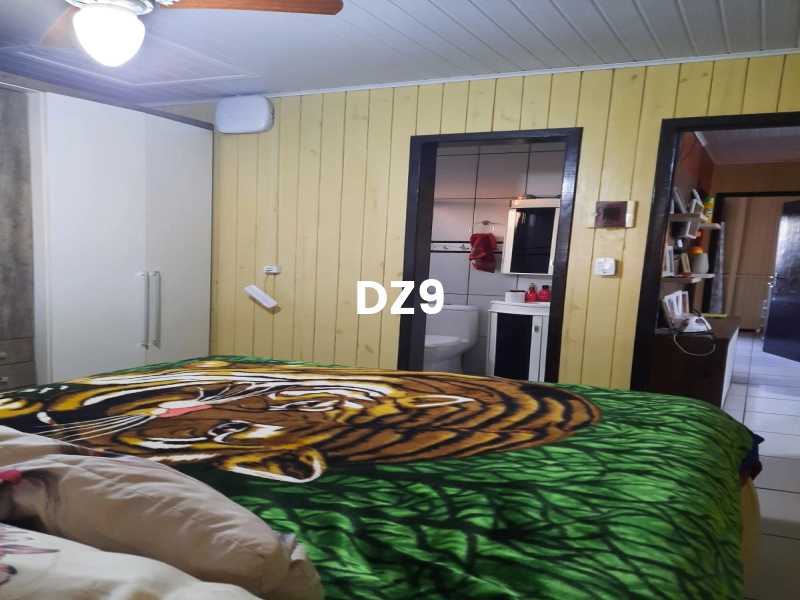 CASA COM 2 DORMITORIOS, SENDO 1 SUITE BEM LOCALIZADA!: 2ª foto da galeria de imagens do imóvel