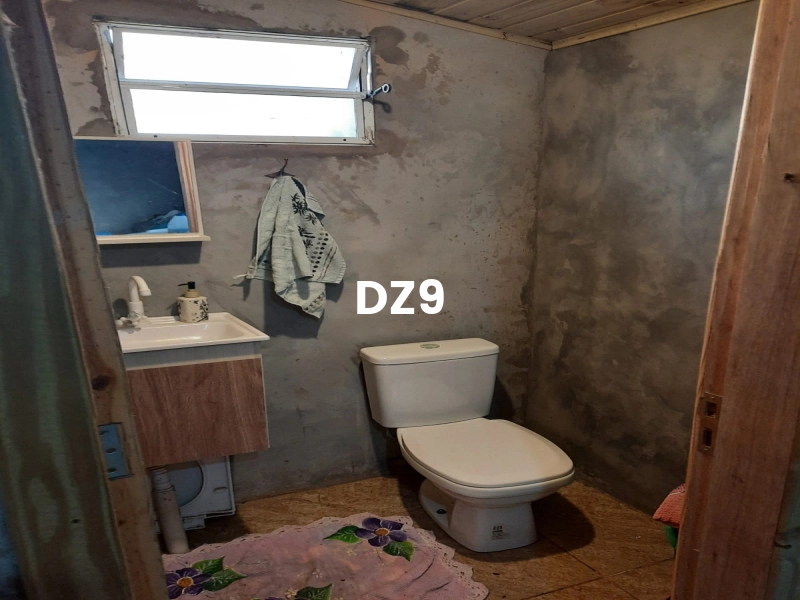 CASA COM 2 DORMITORIOS, SENDO 1 SUITE BEM LOCALIZADA!: 11ª foto da galeria de imagens do imóvel