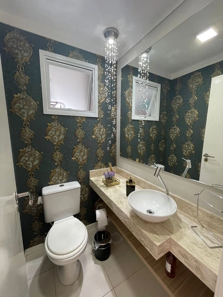 BELO APARTAMENTO DE FRENTE COM TRÊS DORMITÓRIOS EM CAPÃO DA CANOA: 12ª foto da galeria de imagens do imóvel