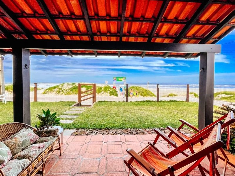 Belíssimo duplex na Beira Mar de  Xangri-lá, composto por 2 dormitório: 3ª foto da galeria de imagens do imóvel