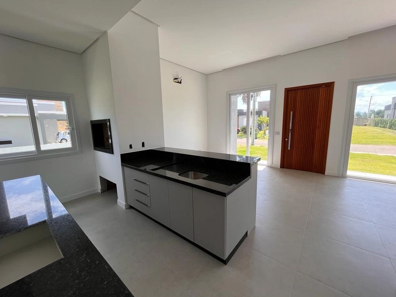 EXCELENTE CASA EM CONDOMÍNIO FECHADO EM CAPÃO DA CANOA: 6ª foto da galeria de imagens do imóvel