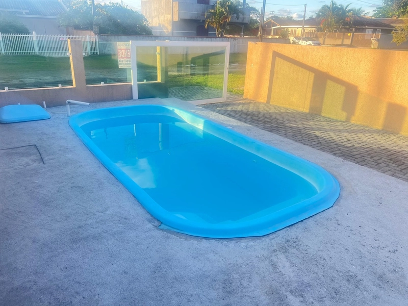 Casa à venda com piscina a poucos metros da praia!: 16ª foto da galeria de imagens do imóvel