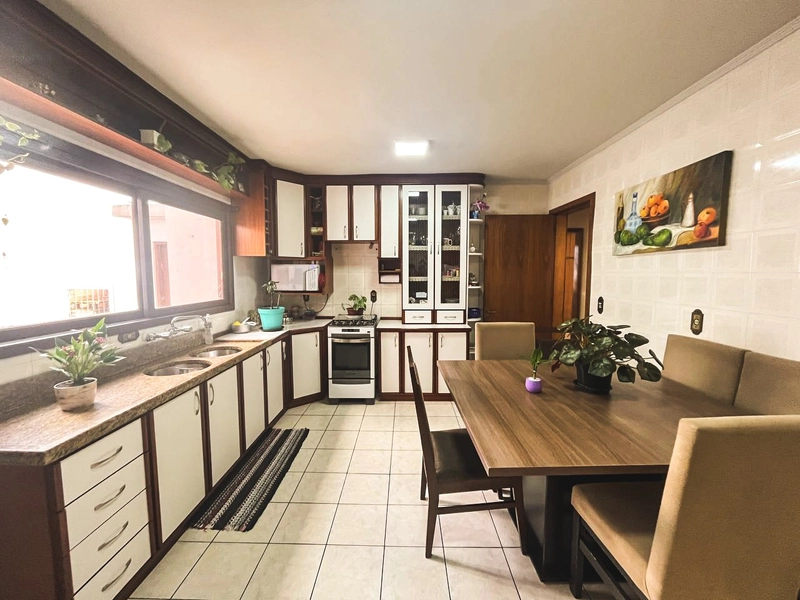 Apartamento semimobiliado com 3 dormitórios e terraço no Santa Catarina: 2ª foto da galeria de imagens do imóvel