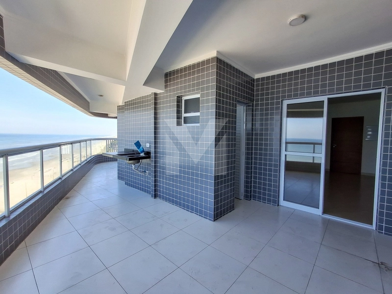 Apartamento frente para o mar com 3 dormitórios na Vila Caiçara: 2ª foto da galeria de imagens do imóvel