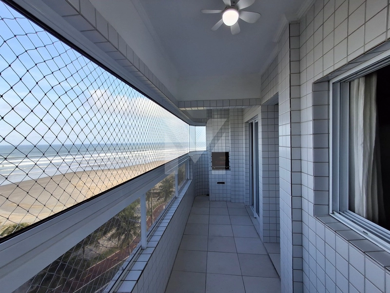 Apartamento frente mar 1 dormitório com sacada gourmet por R$ 450 mil: 2ª foto da galeria de imagens do imóvel