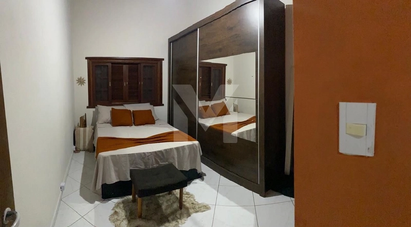 Casa com Piscina no Caiçara – Praia Grande/SP: 2ª foto da galeria de imagens do imóvel