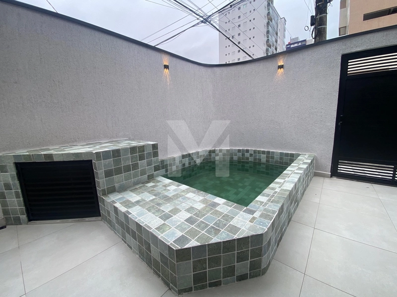 Casa com Piscina na Tupi – 3 Dormitórios e Próxima à Praia: 2ª foto da galeria de imagens do imóvel