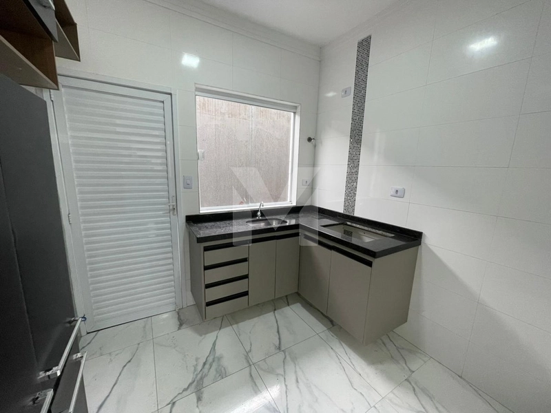 Casa térrea em condomínio no bairro Caiçara, a 2 quadras da praia: 5ª foto da galeria de imagens do imóvel