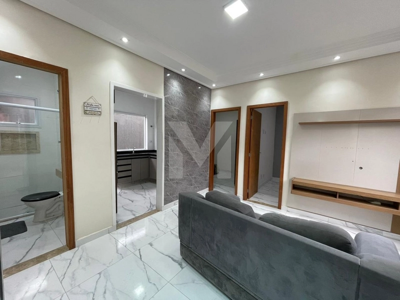 Casa térrea em condomínio no bairro Caiçara, a 2 quadras da praia: 4ª foto da galeria de imagens do imóvel