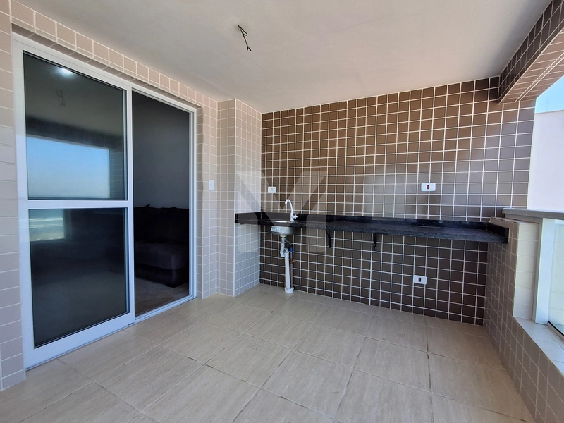 Apartamento 3 dormitórios, frente total para o mar na Vila Mirim.: 7ª foto da galeria de imagens do imóvel