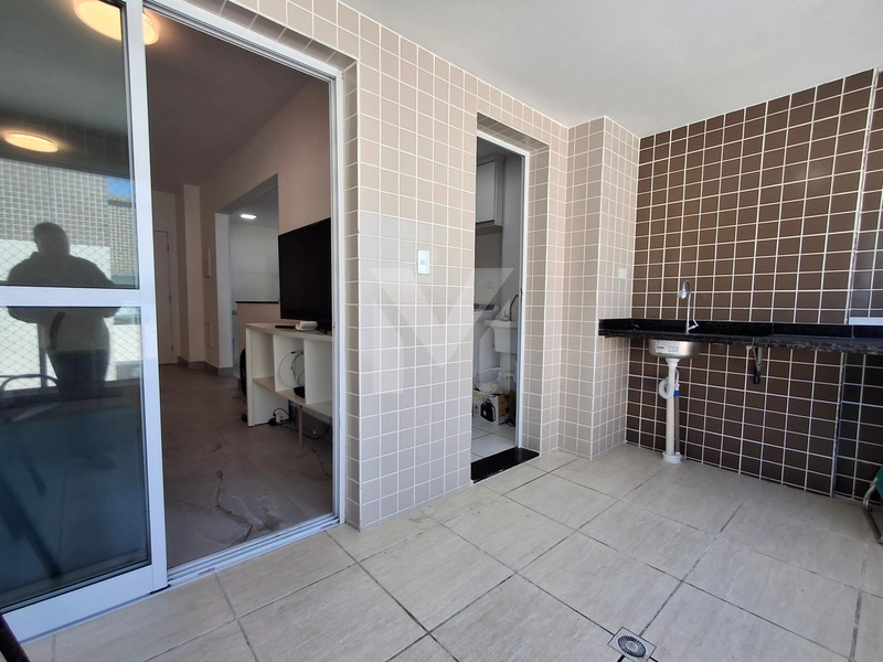Apartamento 2 dormitórios em prédio frente mar na Vila Mirim.: 12ª foto da galeria de imagens do imóvel