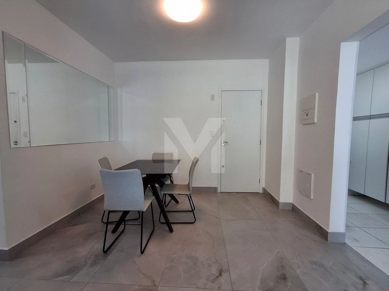 Apartamento 2 dormitórios em prédio frente mar na Vila Mirim.: 6ª foto da galeria de imagens do imóvel