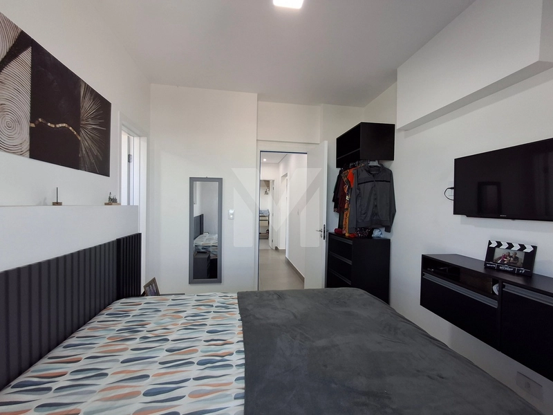 Apartamento frente mar com 3 dormitórios e 2 vagas na Vila Mirim.: 44ª foto da galeria de imagens do imóvel