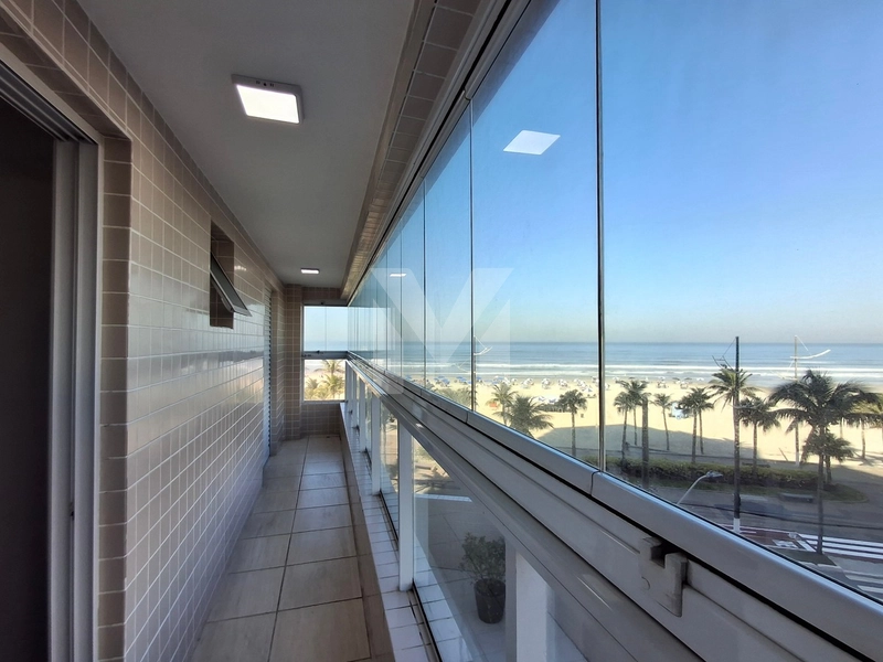 Apartamento frente mar com 3 dormitórios e 2 vagas na Vila Mirim.: 39ª foto da galeria de imagens do imóvel
