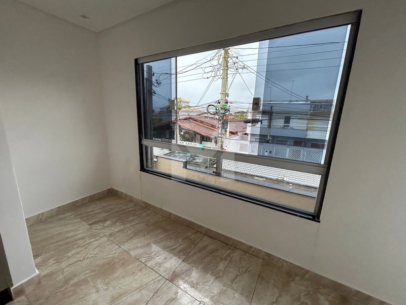 casas em condomínio à venda em Praia Grande, bairro Caiçara: 3ª foto da galeria de imagens do imóvel