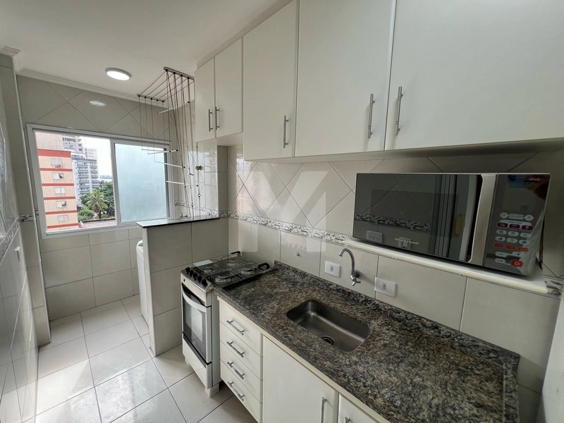 Apartamento na quadra da praia: 13ª foto da galeria de imagens do imóvel
