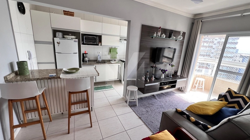 Apartamento a 200 metros do mar na Vila Caiçara: 7ª foto da galeria de imagens do imóvel