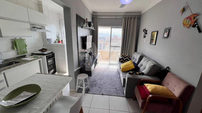 Apartamento a 200 metros do mar na Vila Caiçara: 3ª foto da galeria de imagens do imóvel