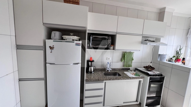 Apartamento a 200 metros do mar na Vila Caiçara: 4ª foto da galeria de imagens do imóvel