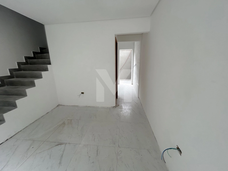 Casa em Condomínio no Bairro Caiçara – Praia Grande: 2ª foto da galeria de imagens do imóvel