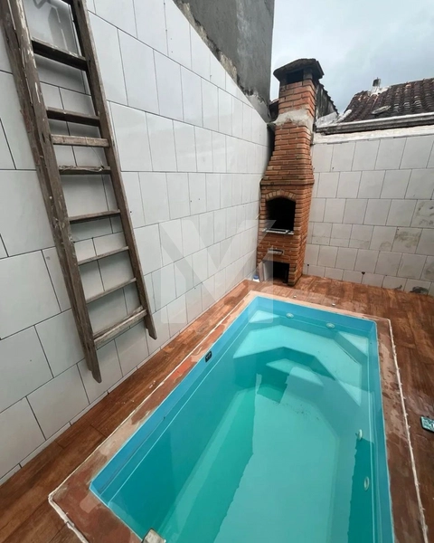 Casa a 350 metros da praia —com piscina e churrasqueira por R$ 530.000: 4ª foto da galeria de imagens do imóvel