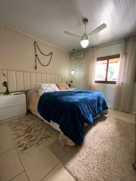 Casa Mobiliada com 3 Dormitórios e Garagem Ampla no Bairro Itapuã: 5ª foto da galeria de imagens do imóvel