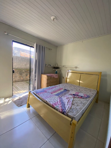 Casa Mobiliada com 3 Dormitórios e Garagem Ampla no Bairro Itapuã: 7ª foto da galeria de imagens do imóvel