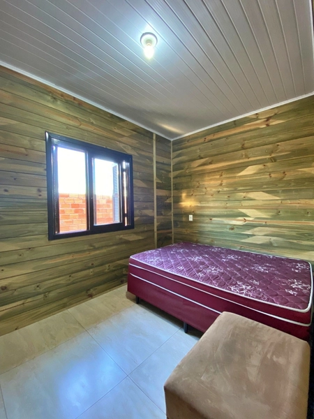 Casa com 3 dormitórios e amplo quintal no bairro Janaína: 5ª foto da galeria de imagens do imóvel