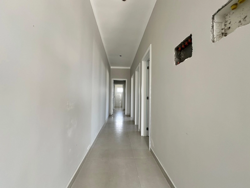 Casa geminada com 3 dormitórios, sendo 1 suíte.: 7ª foto da galeria de imagens do imóvel