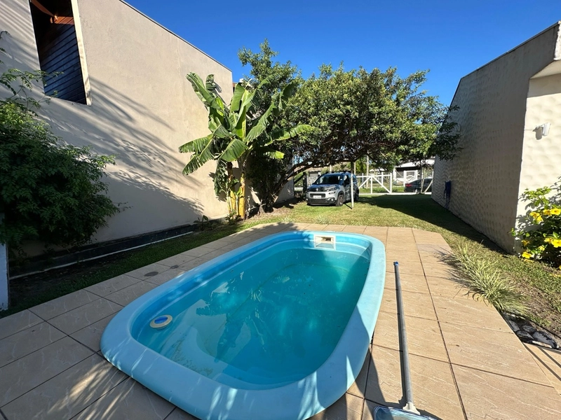 Casa com piscina e espaço gourmet em Atlântida: 2ª foto da galeria de imagens do imóvel