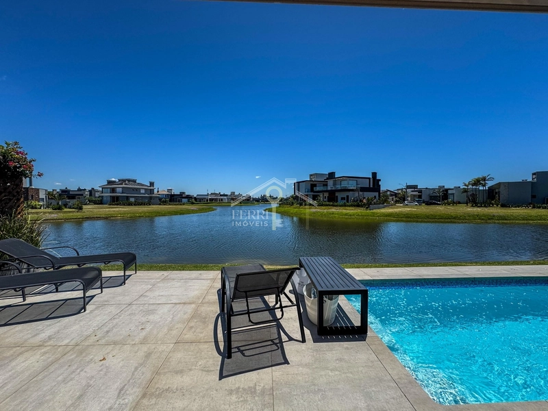 Casa beira-lago com 4 suítes e piscina no condomínio Riviera Xangri-lá: 26ª foto da galeria de imagens do imóvel