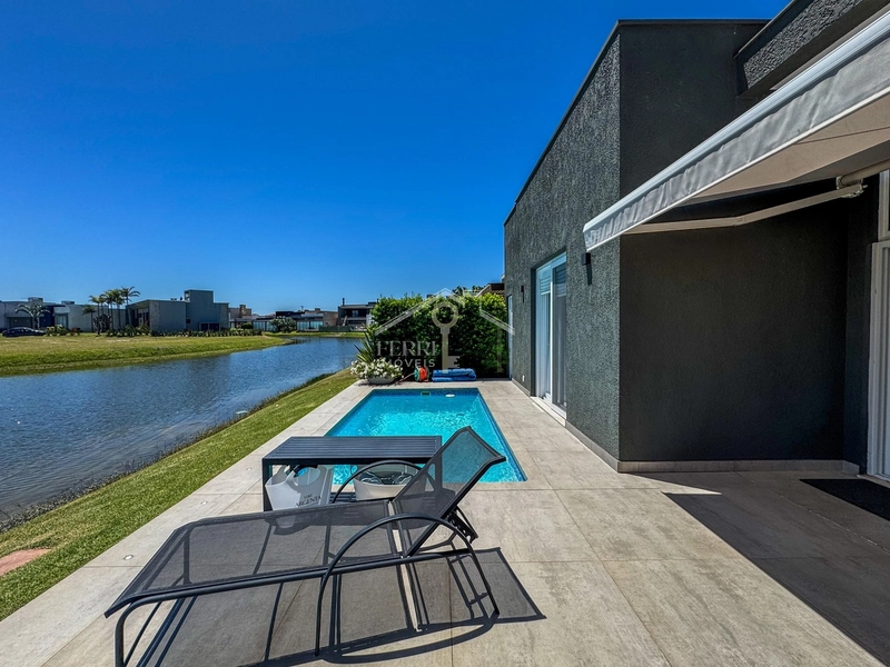 Casa beira-lago com 4 suítes e piscina no condomínio Riviera Xangri-lá: 23ª foto da galeria de imagens do imóvel