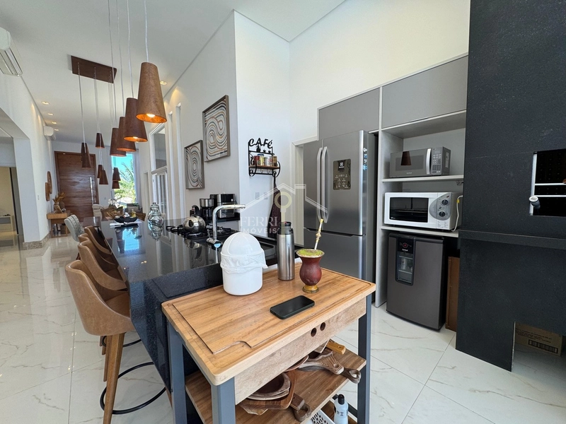 Casa beira-lago com 4 suítes e piscina no condomínio Riviera Xangri-lá: 10ª foto da galeria de imagens do imóvel