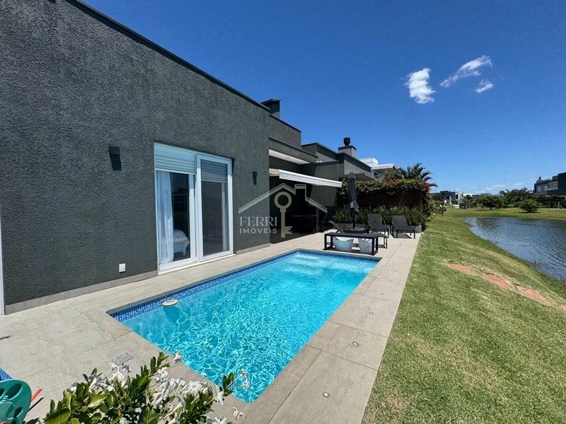 Casa beira-lago com 4 suítes e piscina no condomínio Riviera Xangri-lá: 24ª foto da galeria de imagens do imóvel