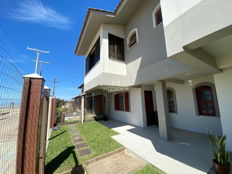 Sobrado com duas suítes na beira mar de Xangri-lá: 4ª foto da galeria de imagens do imóvel