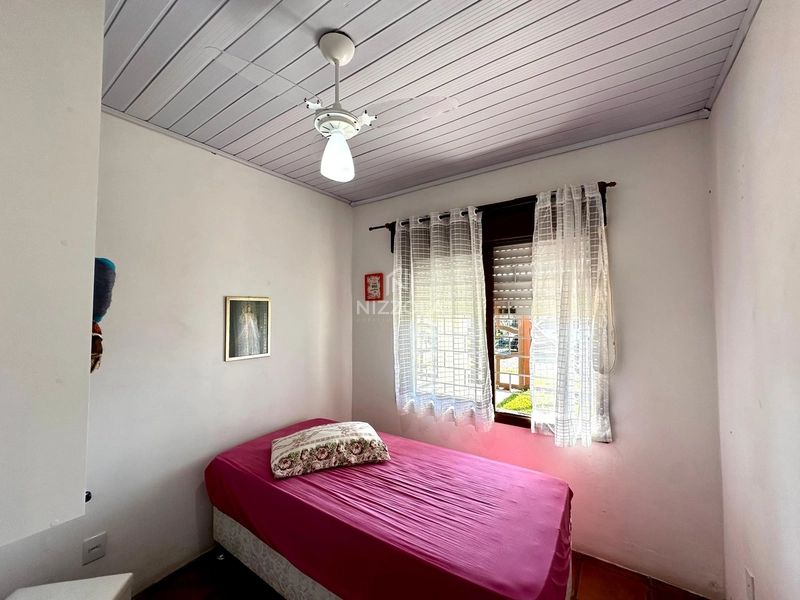 Casa com 5 dormitórios em Atlântida Sul: 3ª foto da galeria de imagens do imóvel