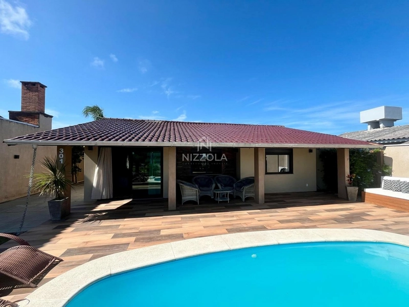 Casa com 4 dormitórios, sendo 2 suítes, no Arpoador em Xangri-Lá: 3ª foto da galeria de imagens do imóvel