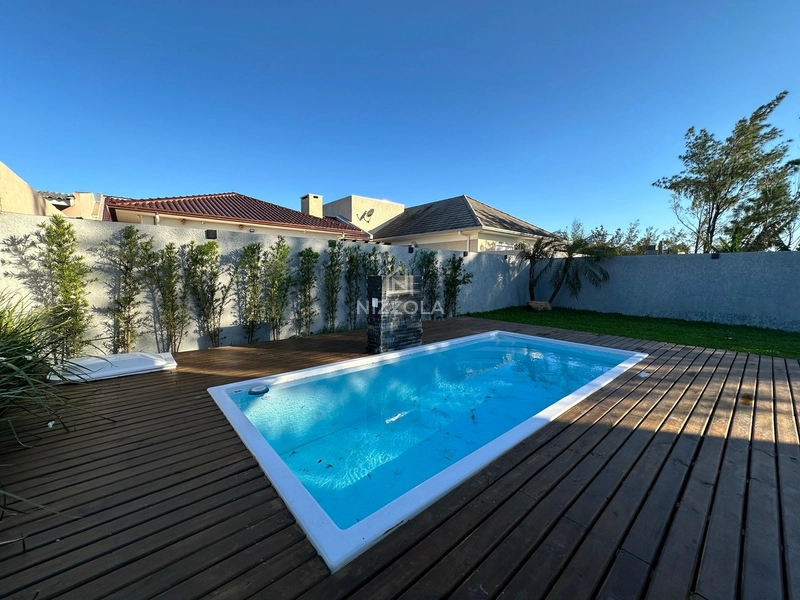 Casa reformada com 3 dormitórios, sendo 1 suíte, em Atlântida Sul: 4ª foto da galeria de imagens do imóvel