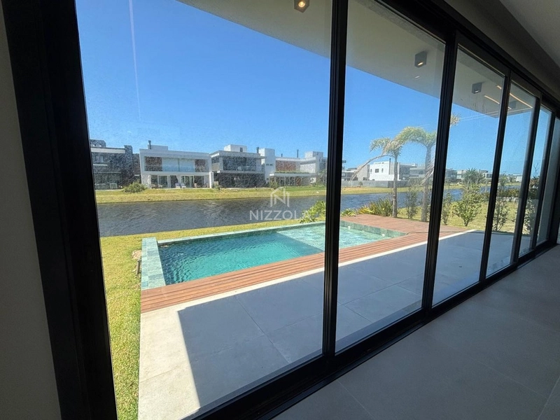 Sobrado beira lago, com 5 suítes, no Condomínio Sunset: 11ª foto da galeria de imagens do imóvel