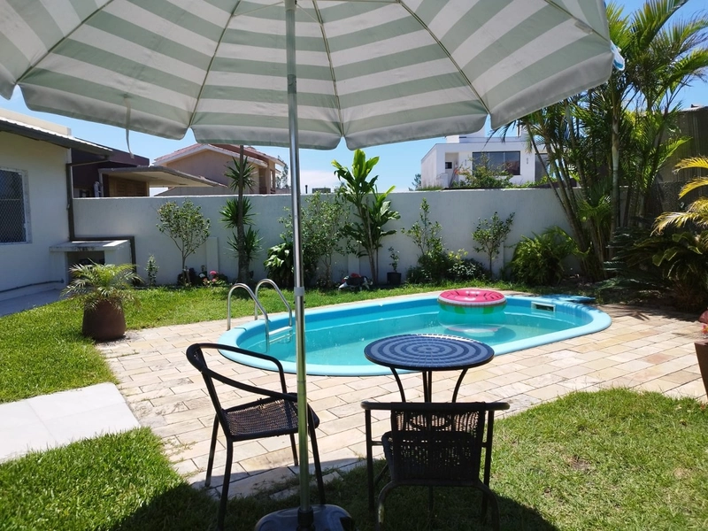 Casa mobiliada com 3 dormitórios na praia do Arpoador em Xangri lá.: 10ª foto da galeria de imagens do imóvel