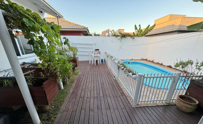 Casa mobiliada e decorada com 4 dormitórios e piscina em Atlântida Sul: 10ª foto da galeria de imagens do imóvel