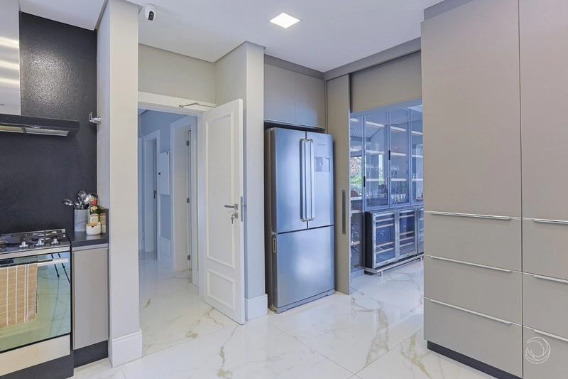 Casa alto padrão com 5 suítes em Cacupé: 11ª foto da galeria de imagens do imóvel