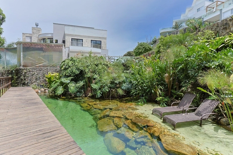 Casa alto padrão com 5 suítes em Cacupé: 26ª foto da galeria de imagens do imóvel
