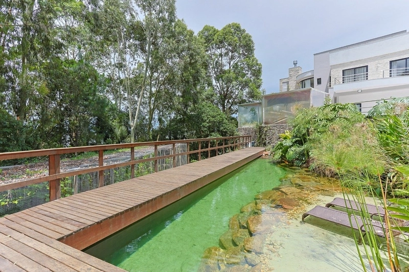 Casa alto padrão com 5 suítes em Cacupé: 27ª foto da galeria de imagens do imóvel
