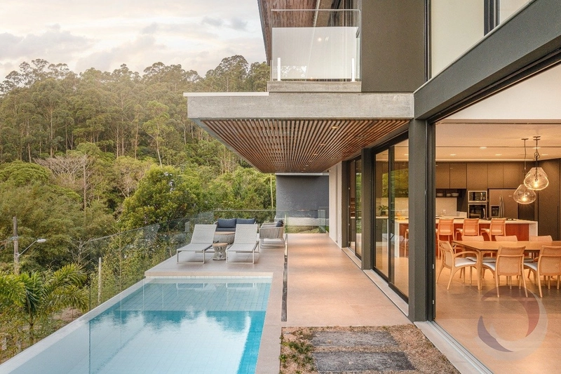 Casa de alto padrão com 4 suítes em Cacupé: 8ª foto da galeria de imagens do imóvel