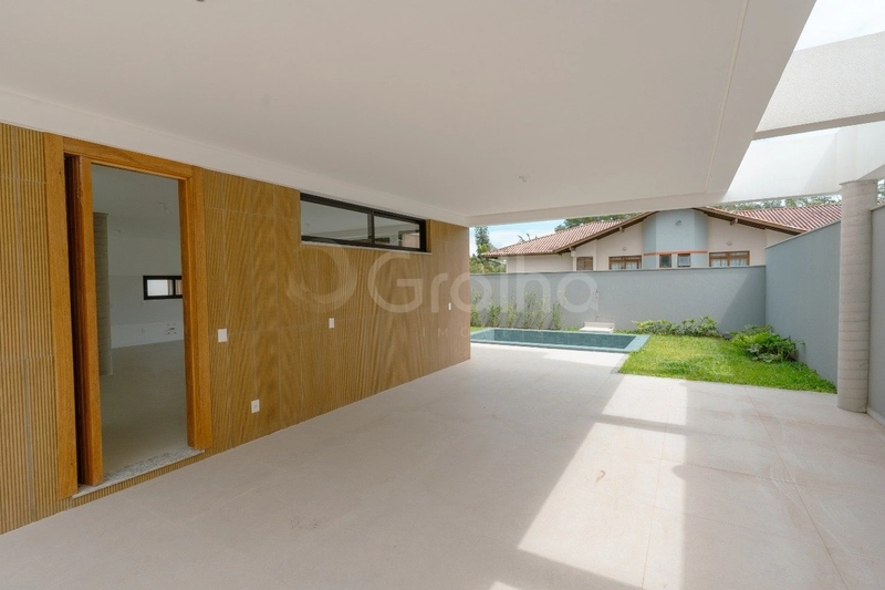 Casa com 4 suítes no Cacupé: 32ª foto da galeria de imagens do imóvel